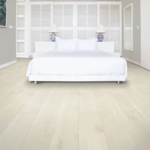 light-colored laminate flooring in bedroom | Coleman's Flooring & Blinds