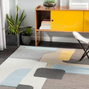 geometric area rug in a home | Coleman's Flooring & Blinds