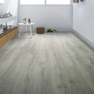 Gray laminate flooring in space | Coleman's Flooring & Blinds