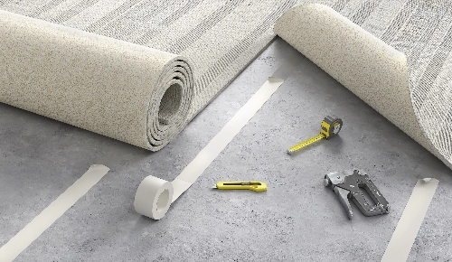 Carpet installation and rolls of carpet | Coleman's Flooring & Blinds